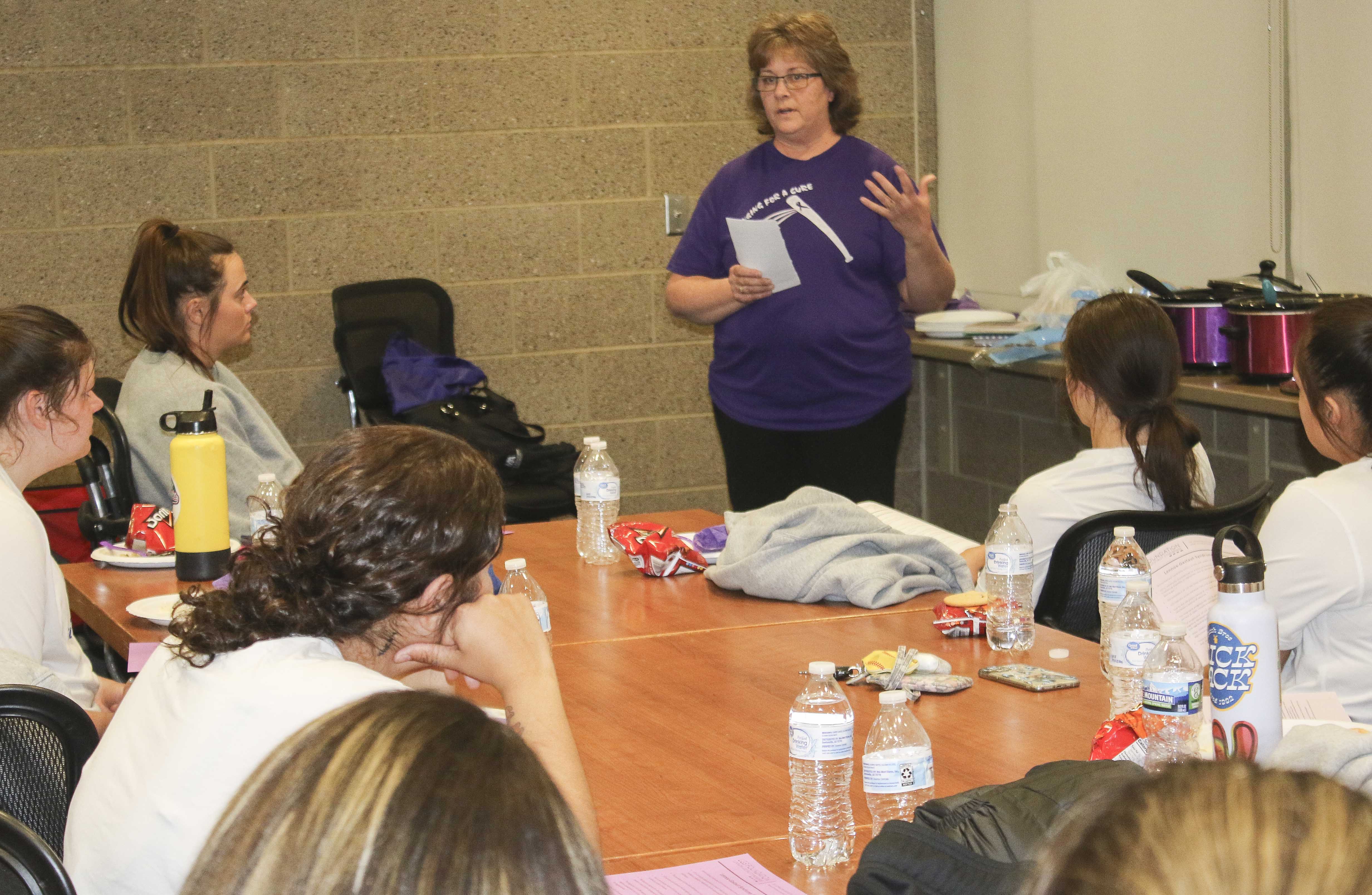 Bonnie Terry speaks with MCC softball players