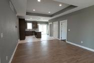 Photo of the dining room to kitchen in the project house at 2121 Iron Eagle Court in North Platte.