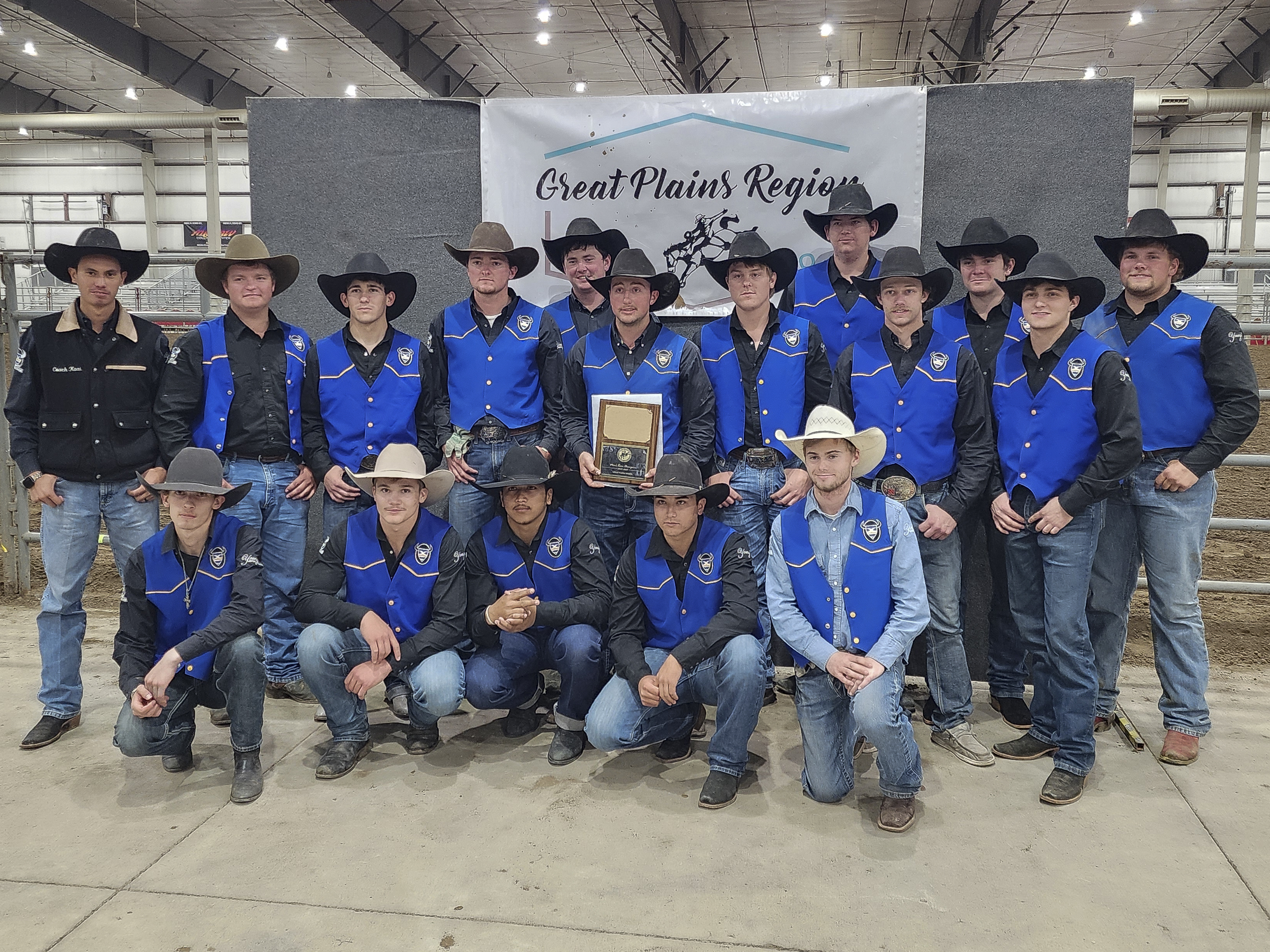 The Mid-Plains Community College men’s rodeo team pose with their Great Plains Region plaque at the conclusion of the Cornhusker College Rodeo on Saturday. 