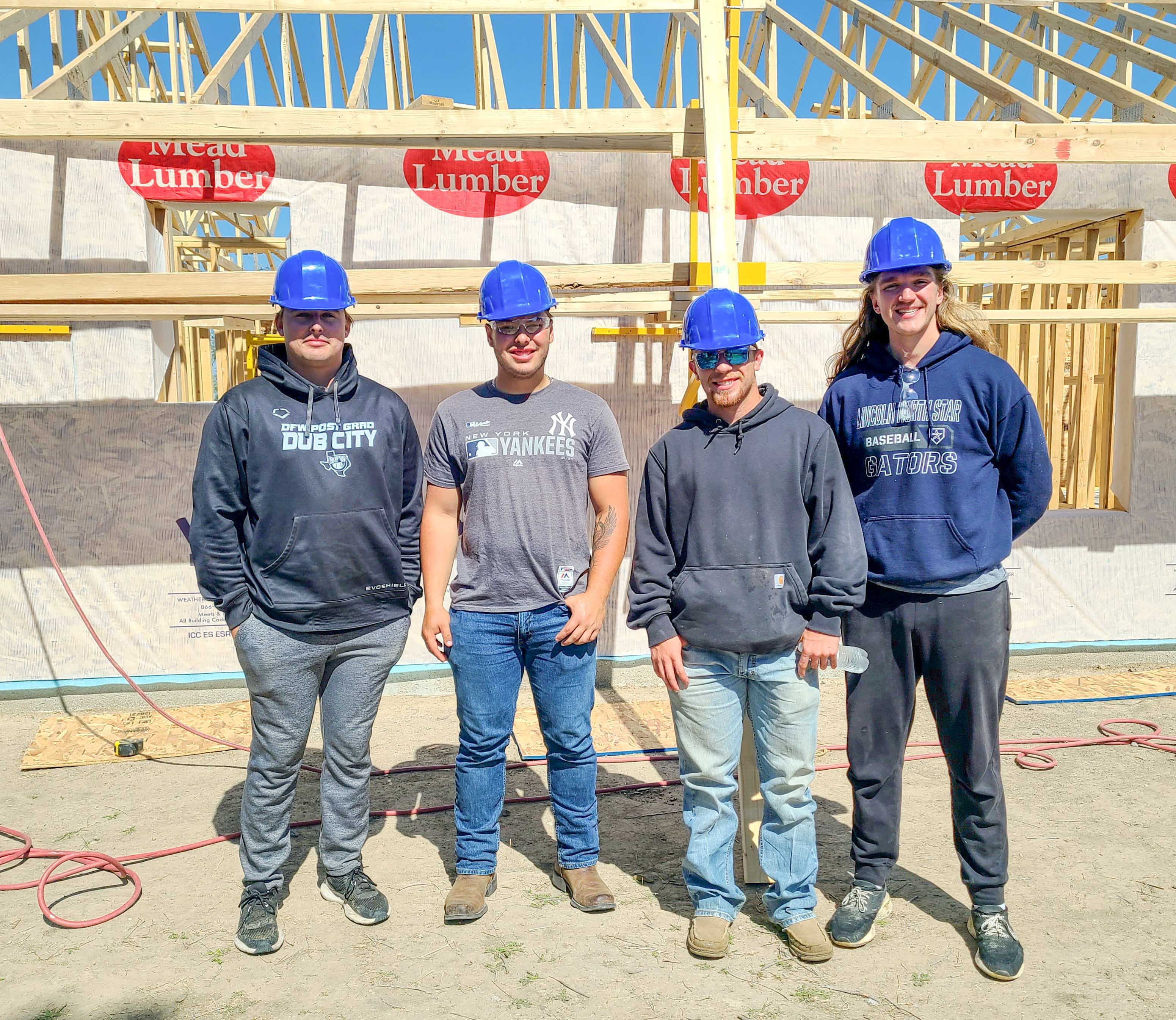 Baseball players lend muscle to Habitat House